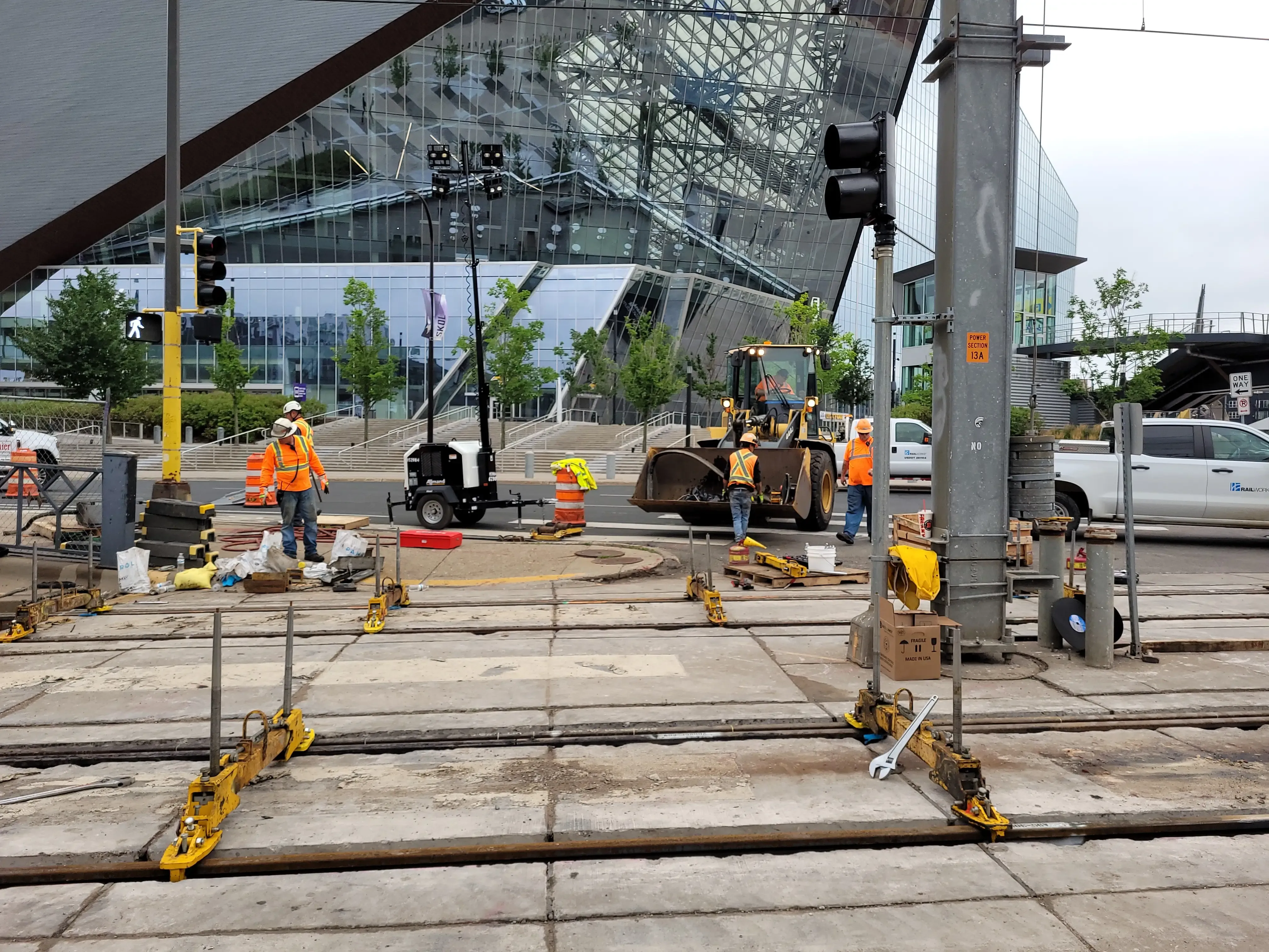 Rail workers in front of US Bank stadium