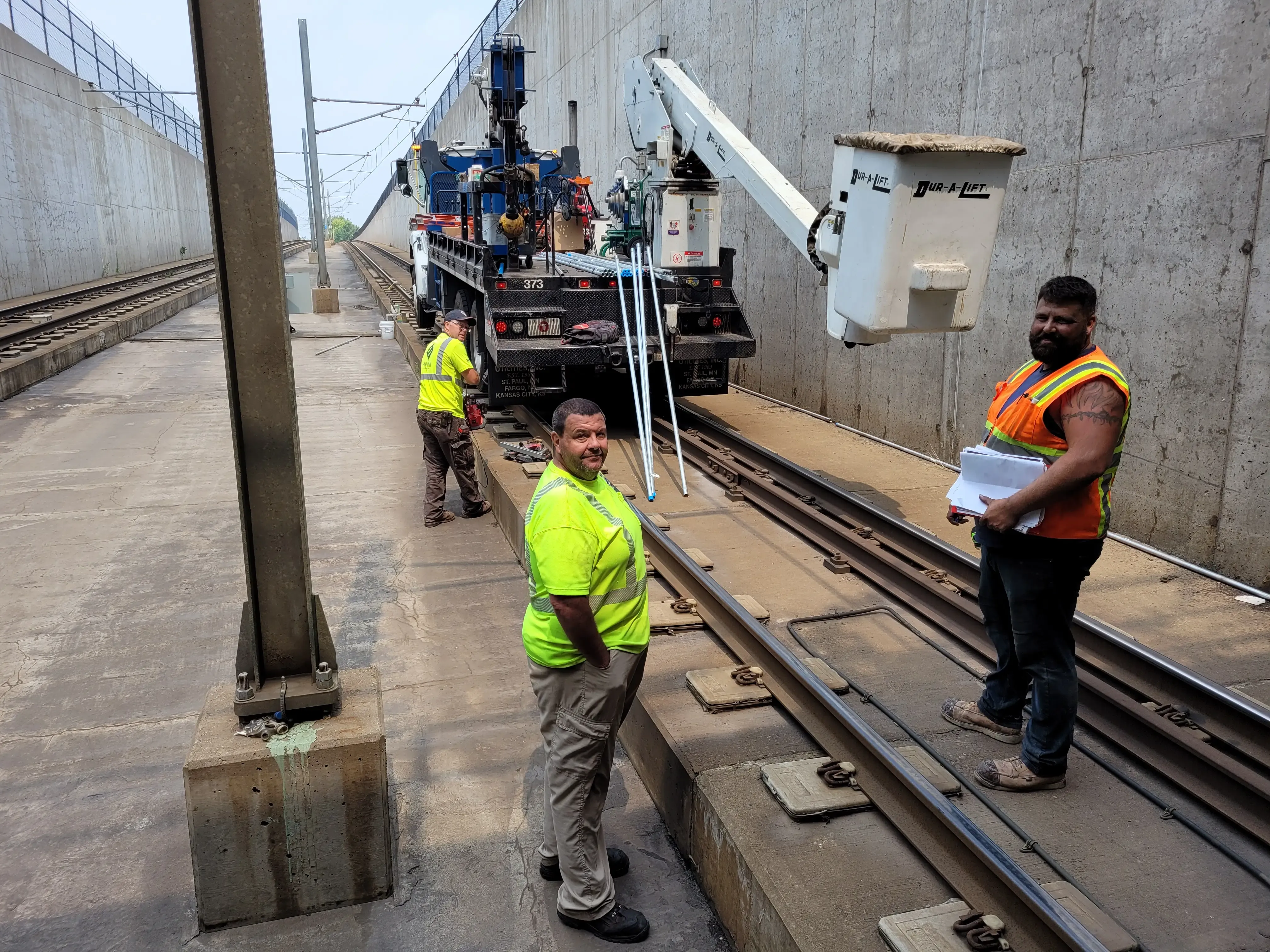 Rail workers installing Intrusion Detection System